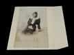 Vintage sepia photo of young woman atop acid-free archival buffered envelope with flap on long edge, no adhesive on flap thumbnail